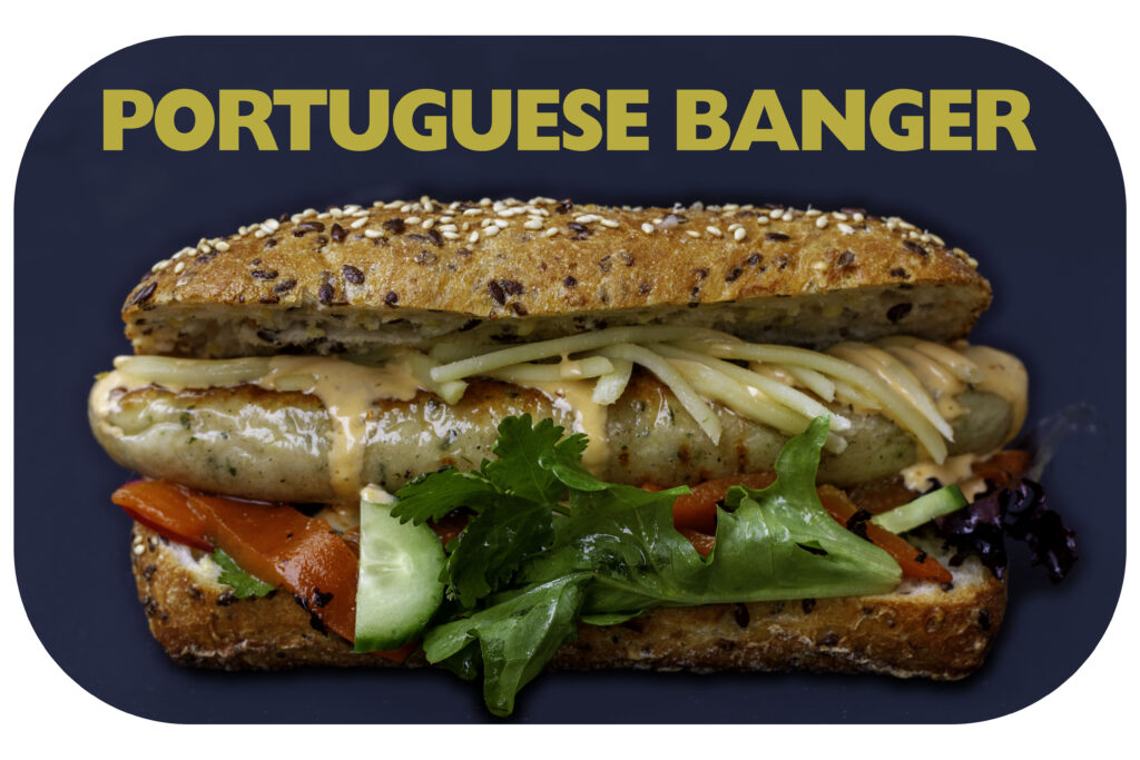 "Portuguese Banger" Chicken sausage, served with roast capsicum, grated cheese, mixed salad with our peri peri mayo